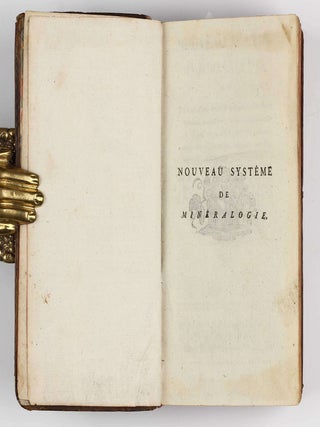 Nouveau systeme de mineralogie, ou Essai d'une nouvelle exposition du regne mineral, auquel on a joint un Supplement au Traite de la dissolution des metaux, avec des observations relatives au Dictionnaire de chymie.